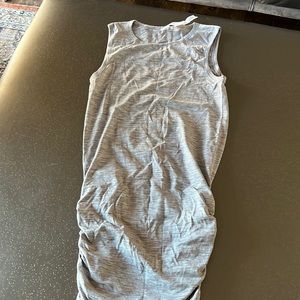 Lululemin size 4 knit dress with ruching on the sides. New without tags